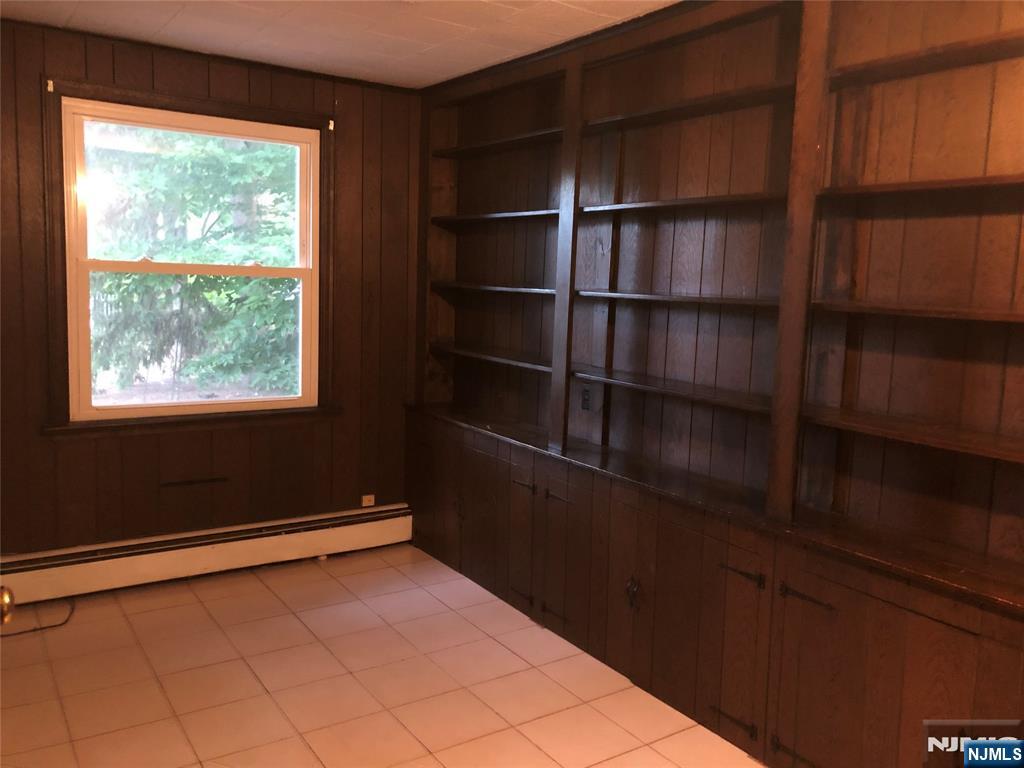 474 Grove Street Ridgewood, NJ 07450 - Photo 16 of 19 a view of an empty room with a window