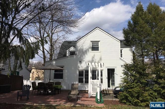 474 Grove Street Ridgewood, NJ 07450 - Photo 5 of 19 a view of a house with a yard