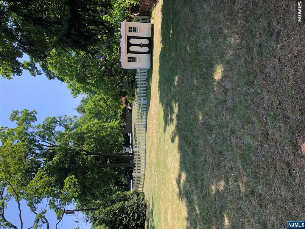 474 Grove Street Ridgewood, NJ 07450 - Photo 7 of 19 a view of a house with a yard