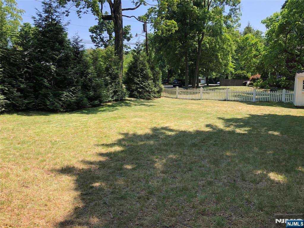 474 Grove Street Ridgewood, NJ 07450 - Photo 8 of 19 a view of swimming pool with an outdoor space and seating area