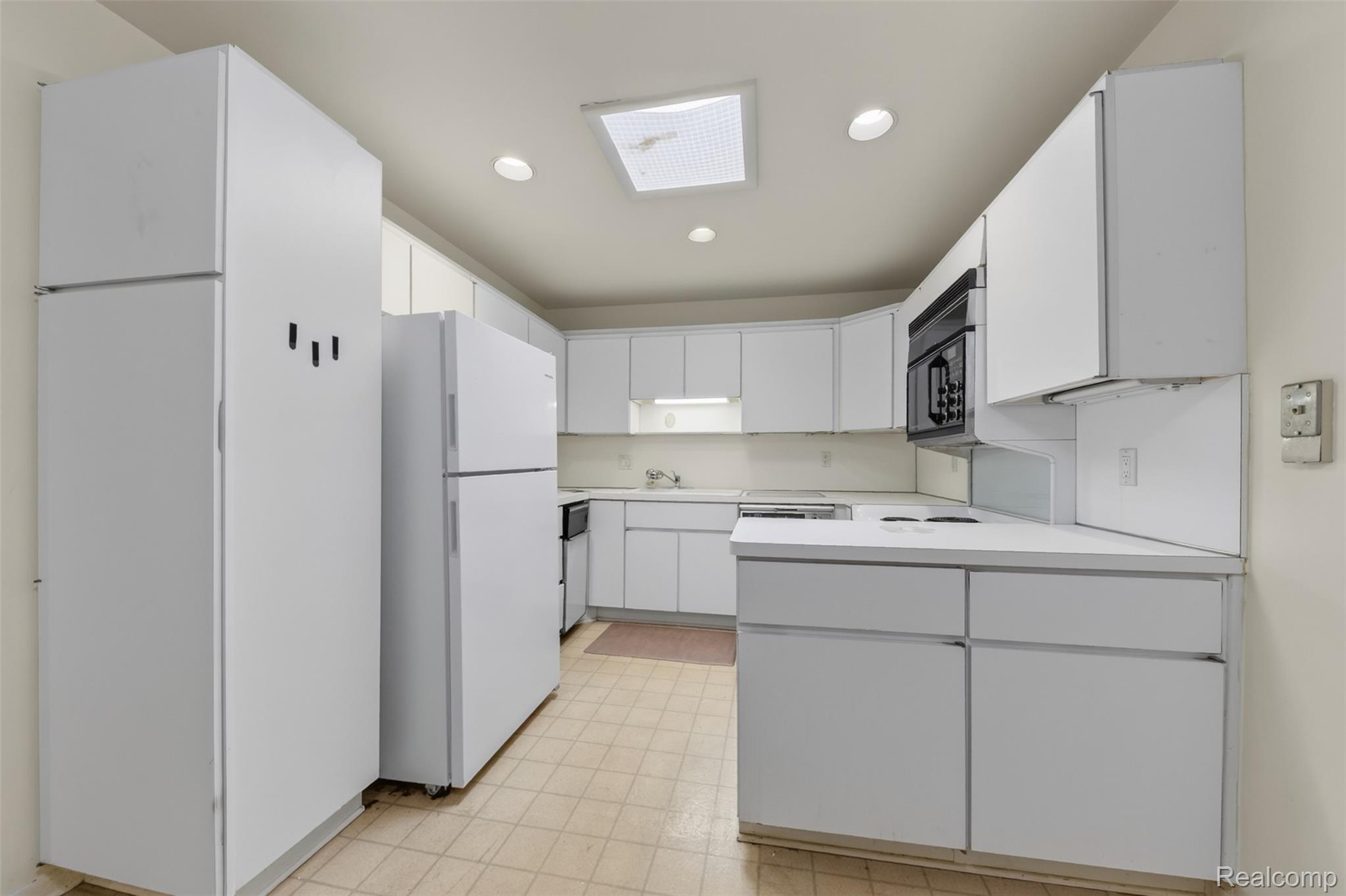 31915 West 14 Mile Road Farmington, MI 48334 - Photo 15 of 47 Kitchen featuring white cabinetry, integrated wall oven, and recessed lighting