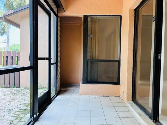 a kitchen with stainless steel appliances granite countertop a refrigerator a stove and a sink