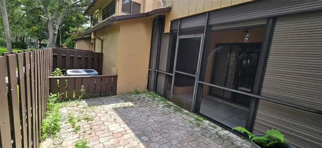 a view of a glass door and the balcony