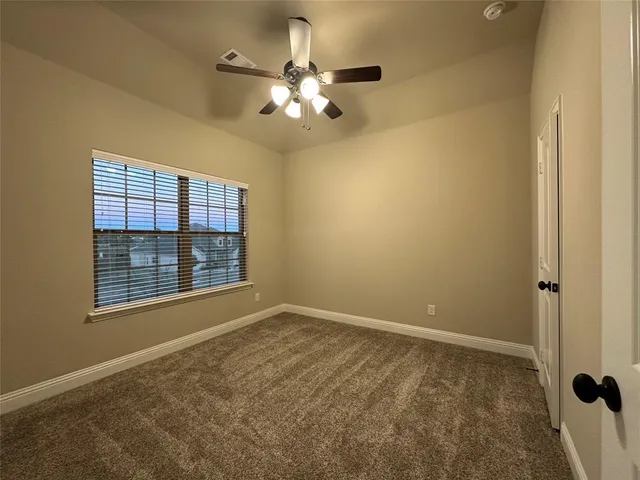 a bathroom with a sink a mirror and a shower