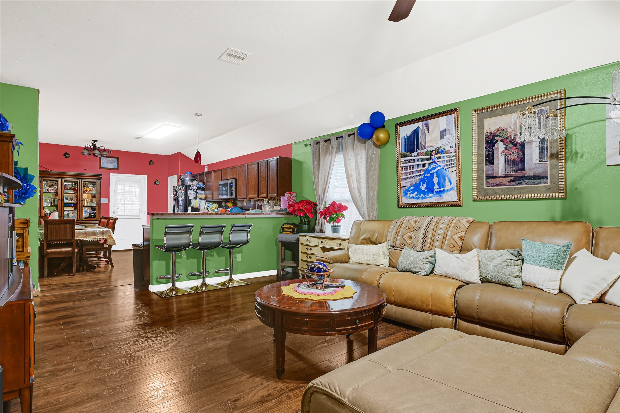 2902 Back Bay Brook Trail Houston, TX 77045 - Photo 6 of 20 a living room with furniture kitchen view and a fireplace