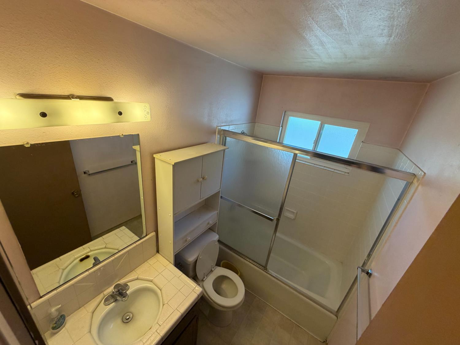 1613 Call Way Modesto, CA 95355 - Photo 8 of 13 a bathroom with a sink and mirror