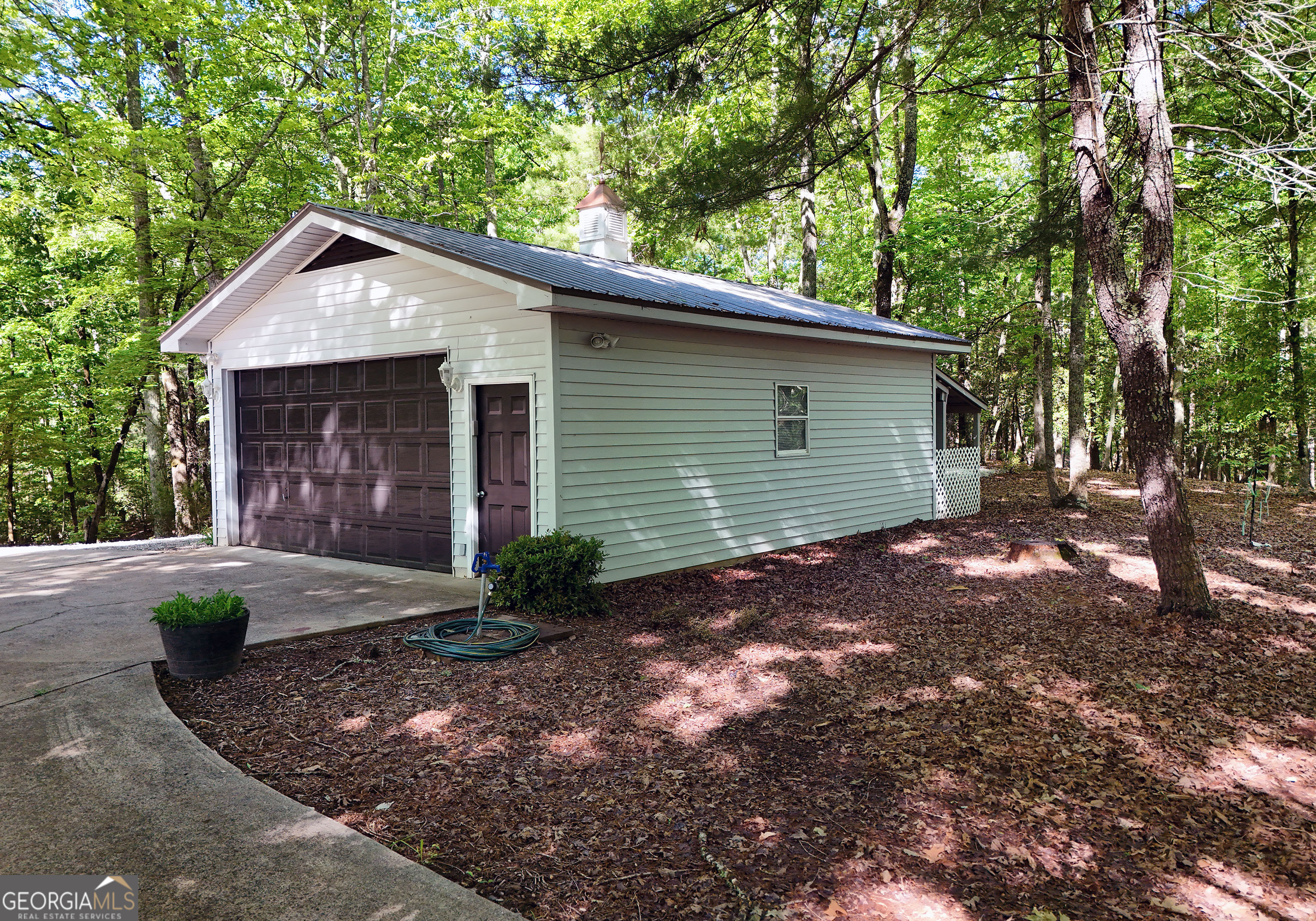 382 Pat Colwell Road, Unit TRACT 1 Blairsville, GA 30512 - Photo 12 of 43 a view of a house with a yard and large tree