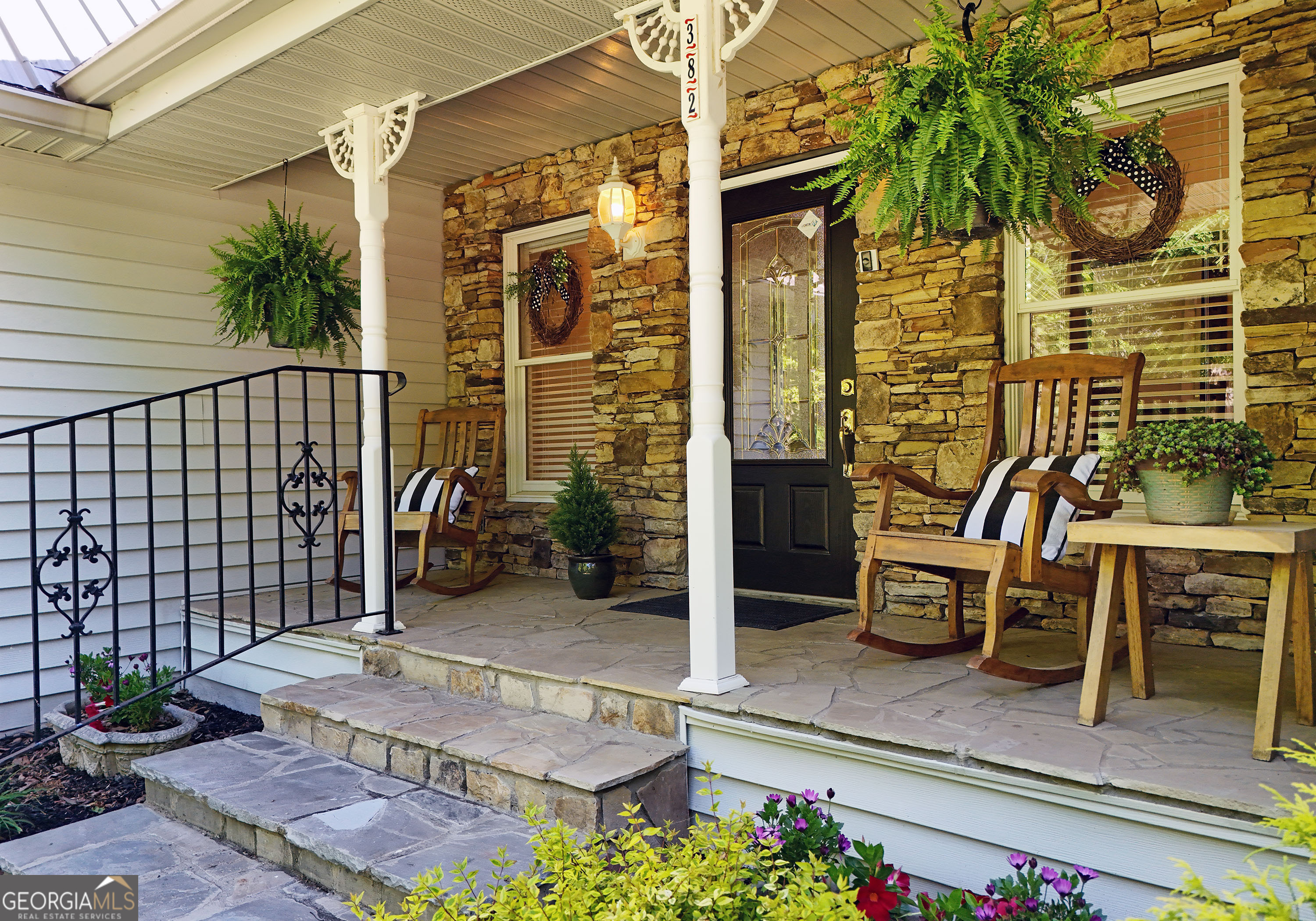 382 Pat Colwell Road, Unit TRACT 1 Blairsville, GA 30512 - Photo 24 of 43 a view of two chairs and table in the patio