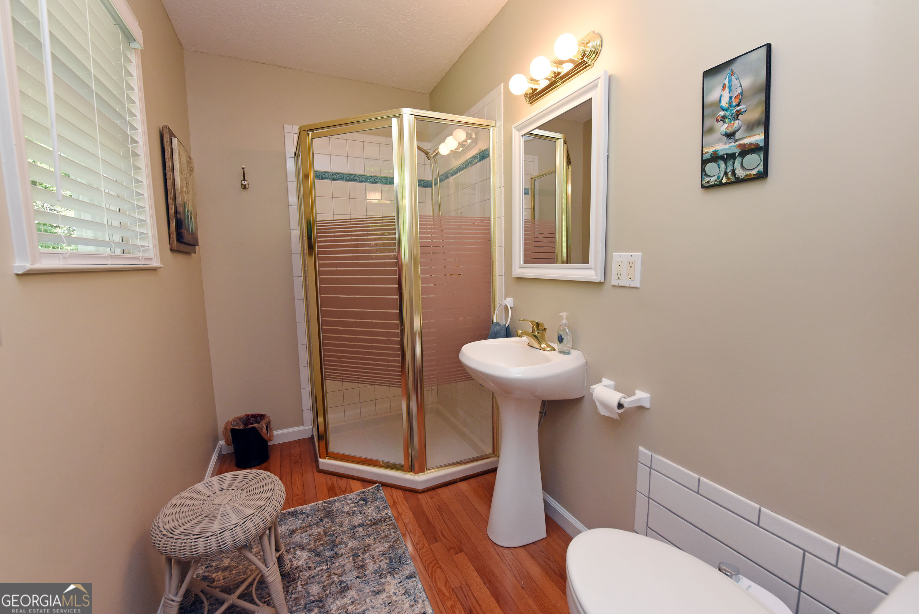 382 Pat Colwell Road, Unit TRACT 1 Blairsville, GA 30512 - Photo 27 of 43 a bathroom with a sink toilet and shower