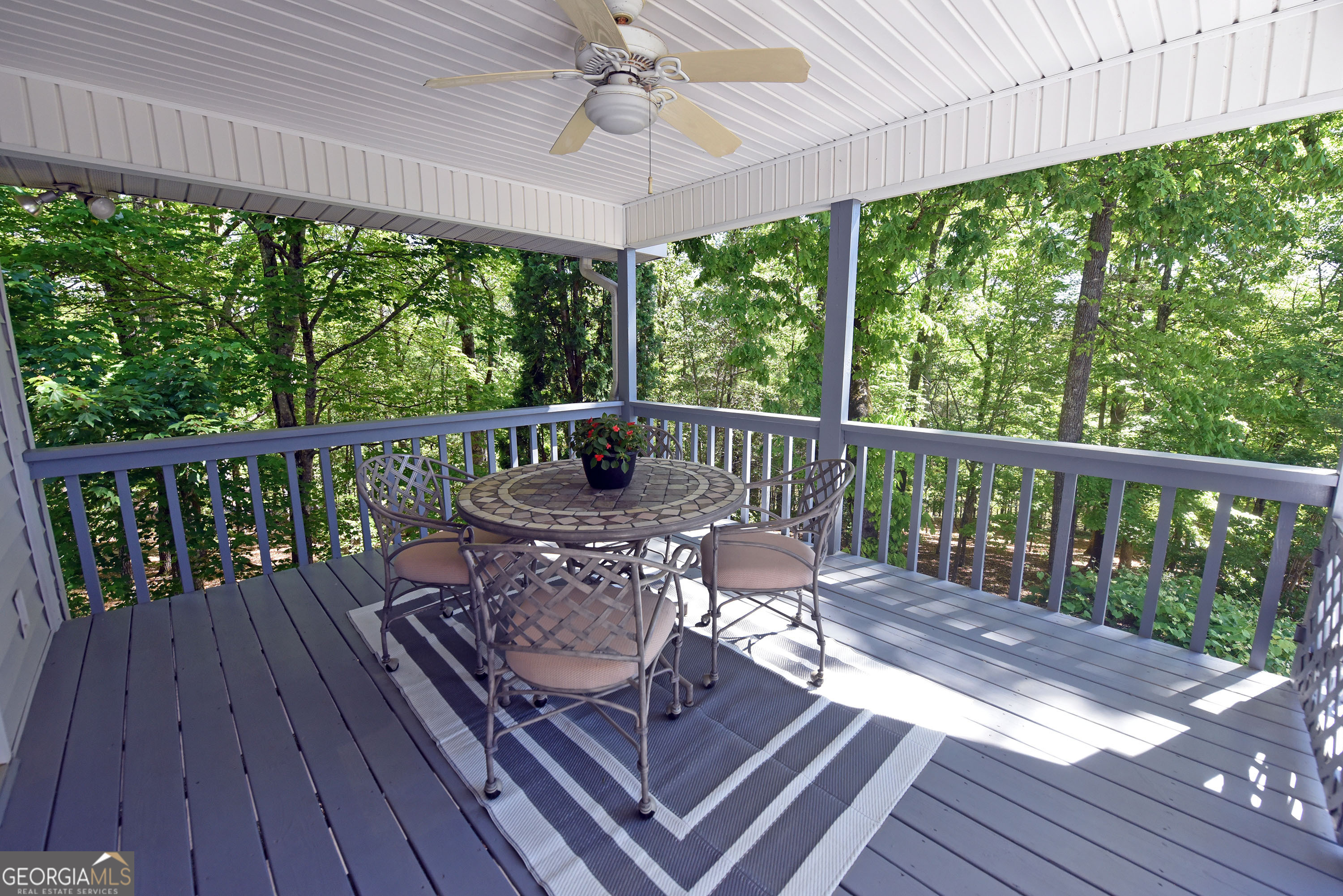 382 Pat Colwell Road, Unit TRACT 1 Blairsville, GA 30512 - Photo 31 of 43 a view of a two chairs in the deck