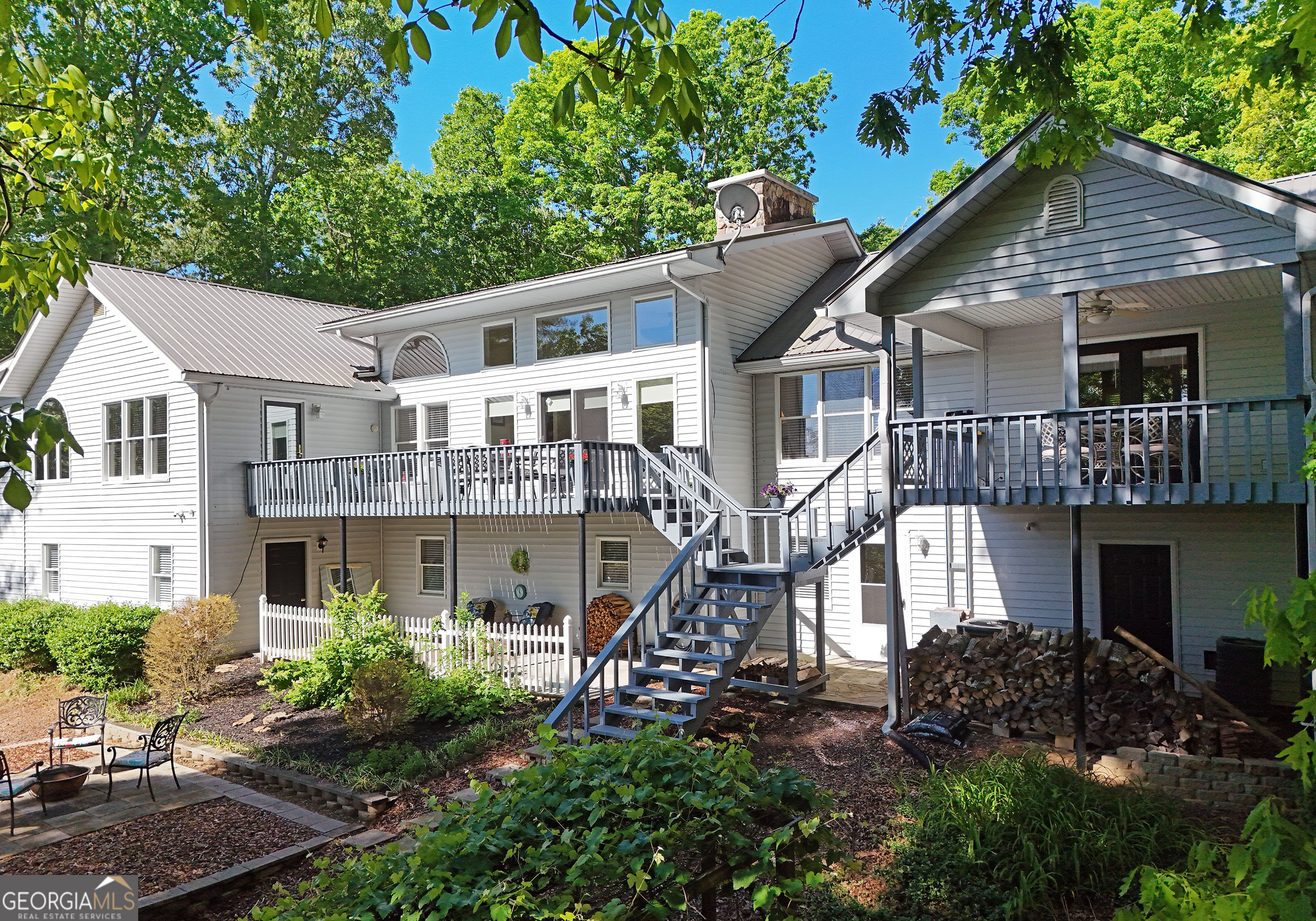 382 Pat Colwell Road, Unit TRACT 1 Blairsville, GA 30512 - Photo 40 of 43 a front view of a house with a garden
