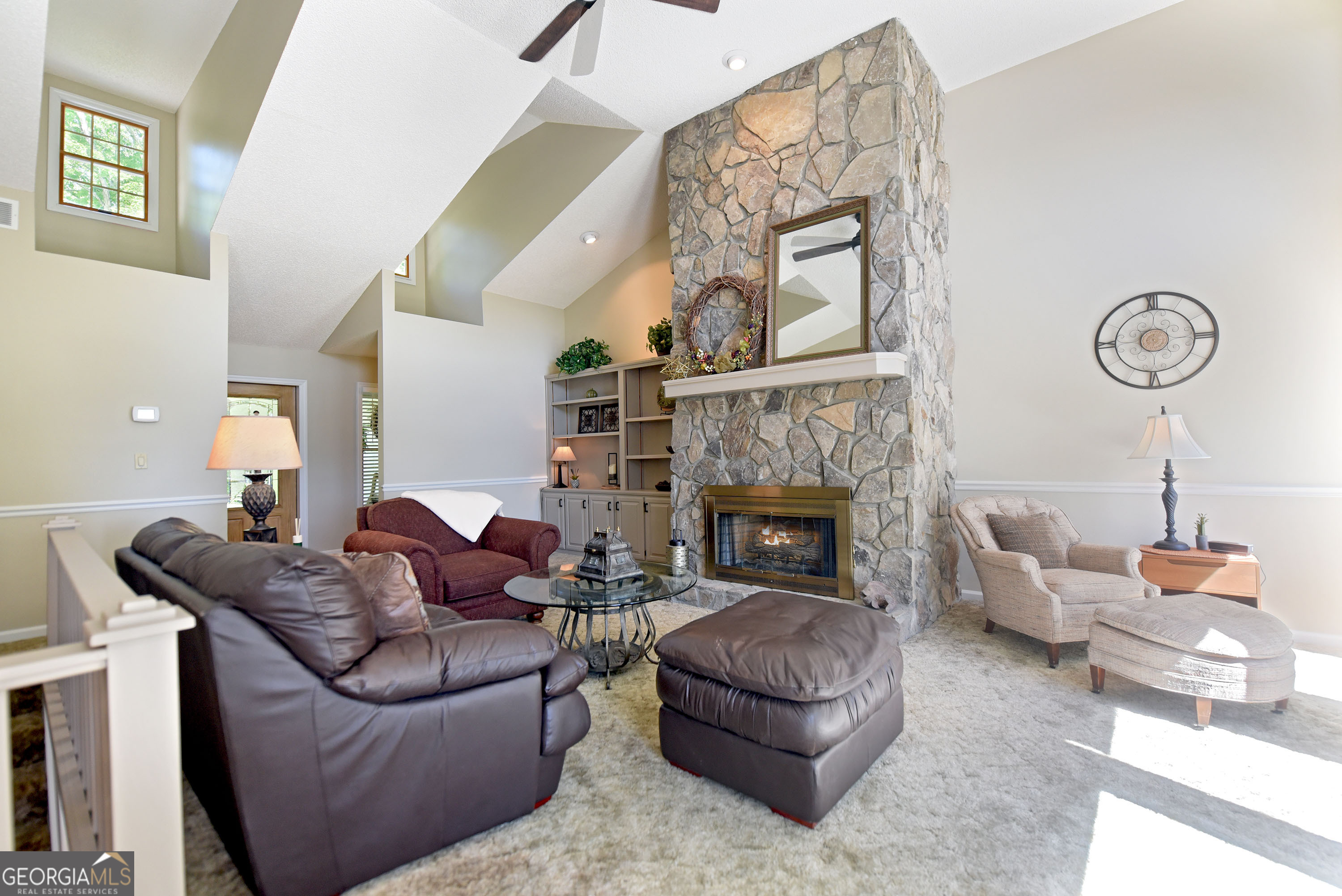 382 Pat Colwell Road, Unit TRACT 1 Blairsville, GA 30512 - Photo 42 of 43 a living room with furniture and a fireplace