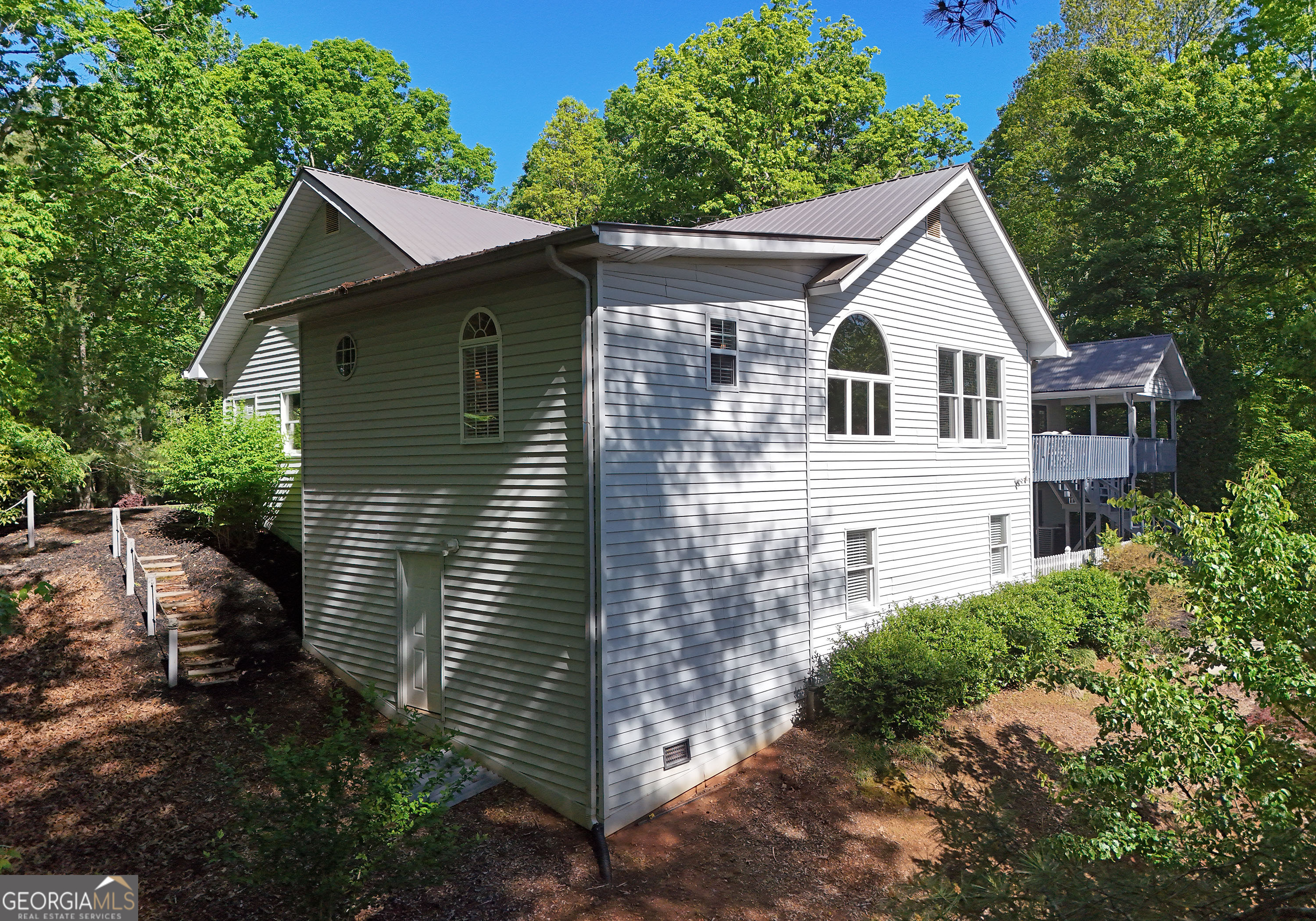 382 Pat Colwell Road, Unit TRACT 1 Blairsville, GA 30512 - Photo 43 of 43 a front view of a house with garden