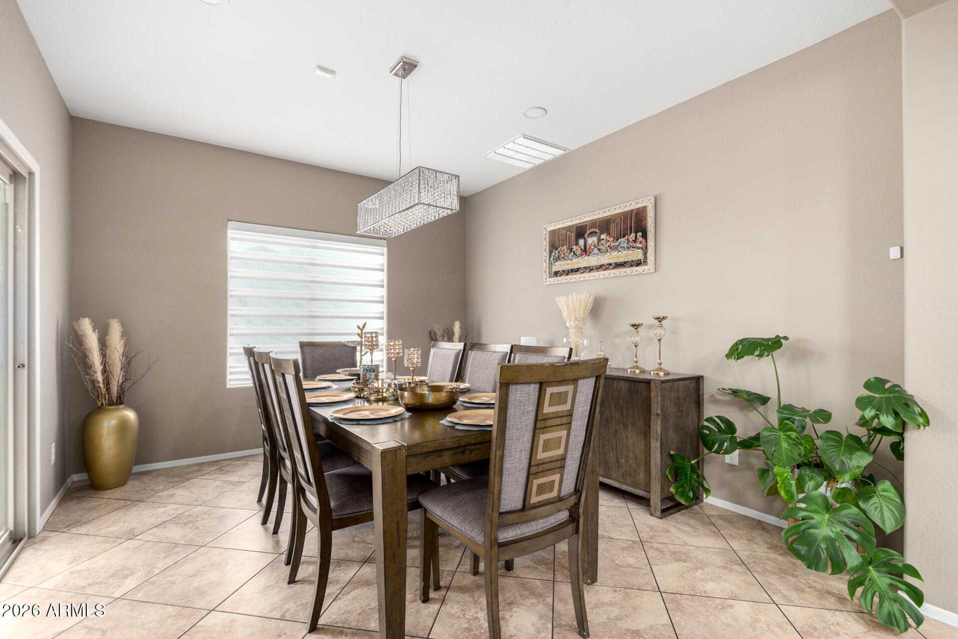 10816 West Nosean Road Peoria, AZ 85383 - Photo 12 of 42 a view of a dining room with furniture and window