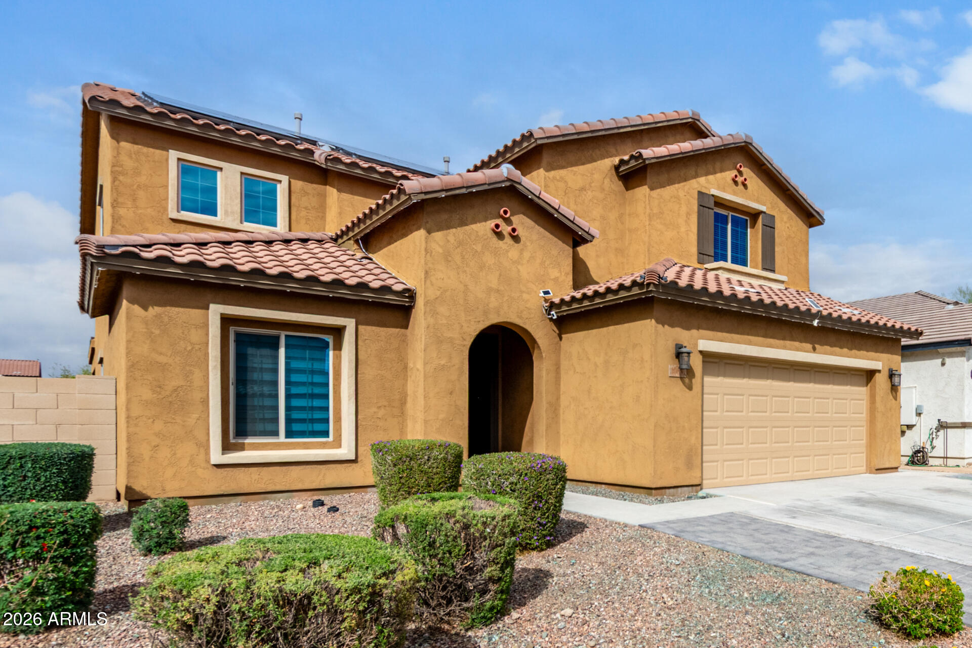 10816 West Nosean Road Peoria, AZ 85383 - Photo 3 of 42 front view of a house with a yard