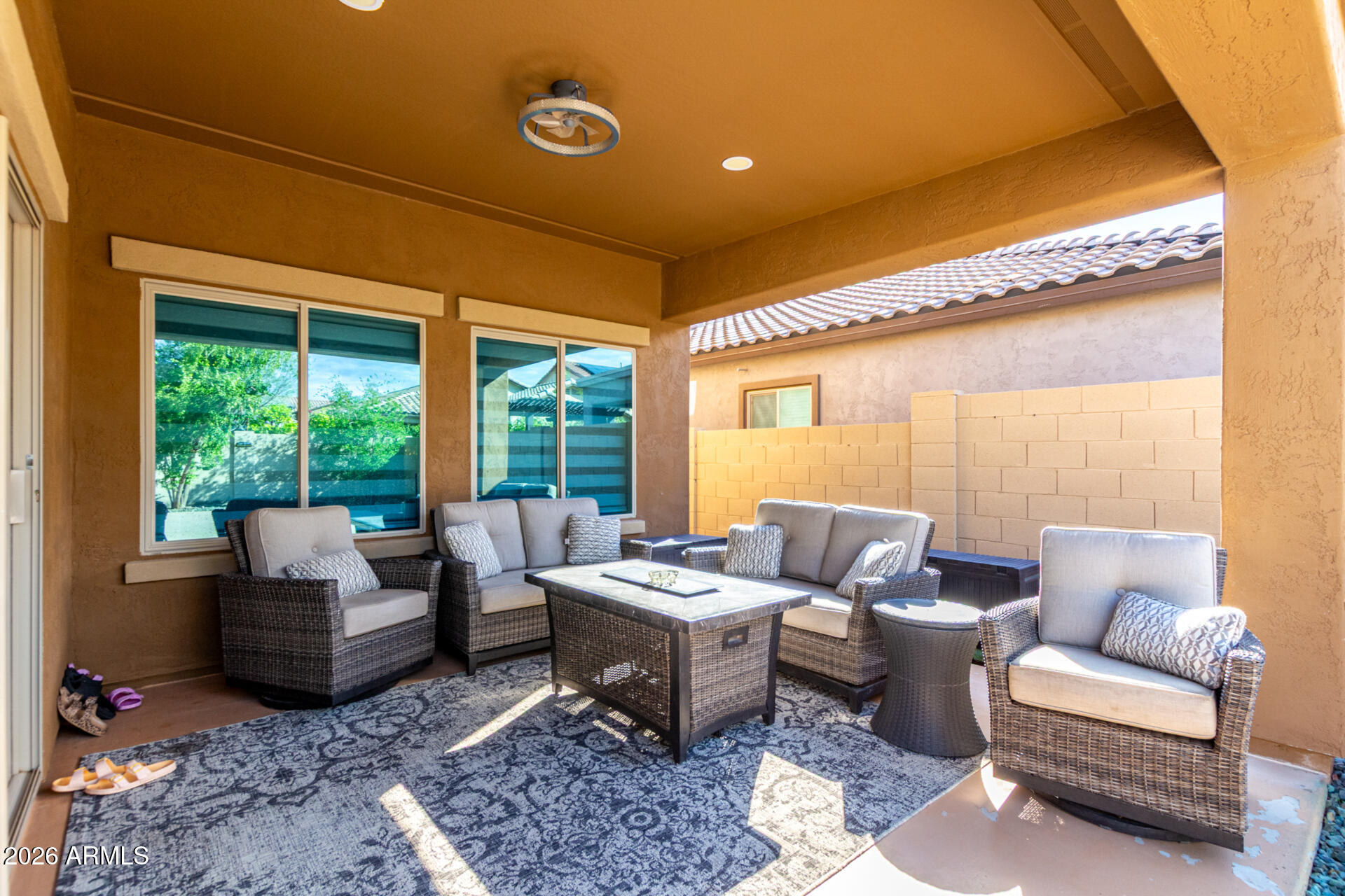 10816 West Nosean Road Peoria, AZ 85383 - Photo 40 of 42 a living room with furniture and a large window