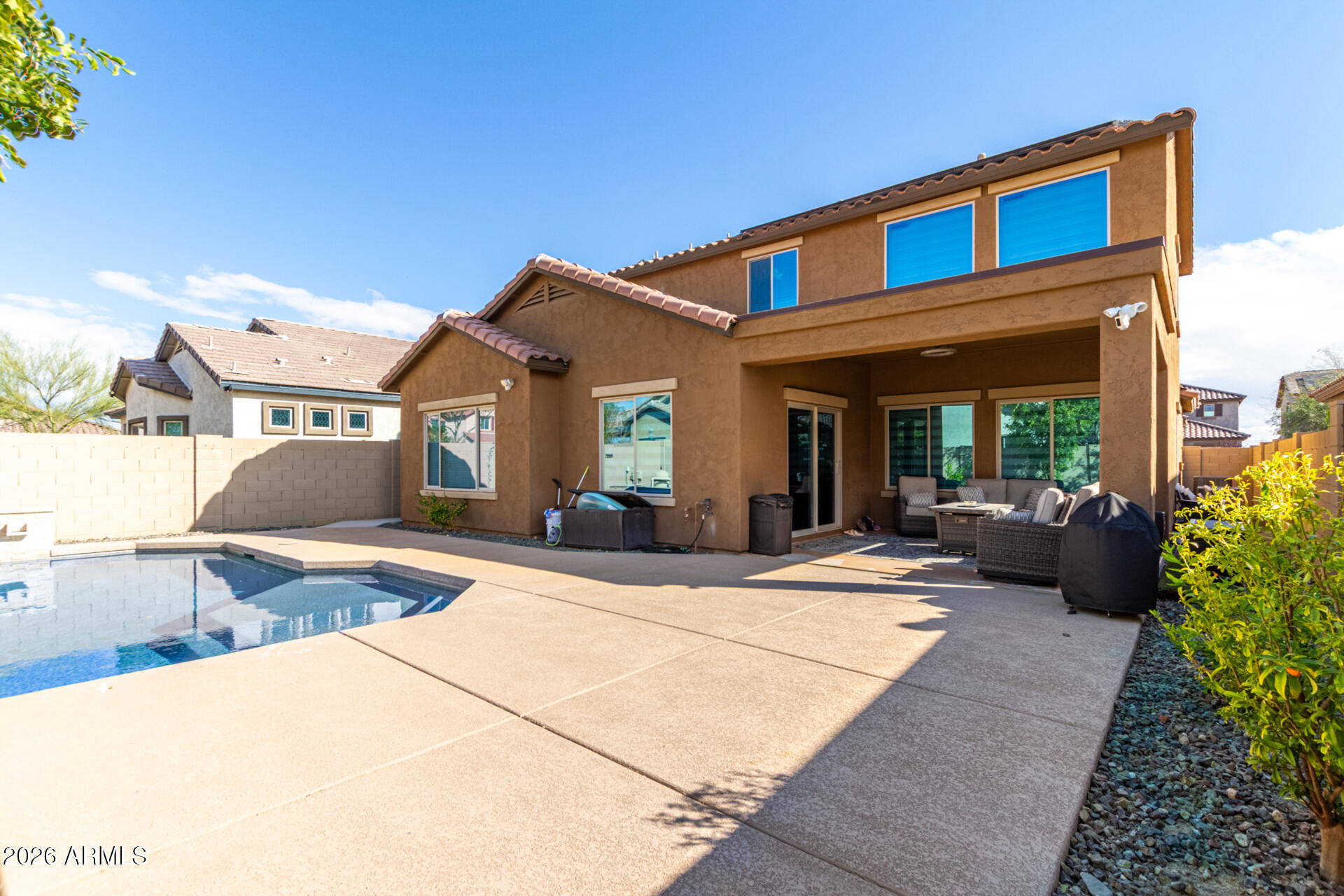 10816 West Nosean Road Peoria, AZ 85383 - Photo 41 of 42 a view of a house with a patio