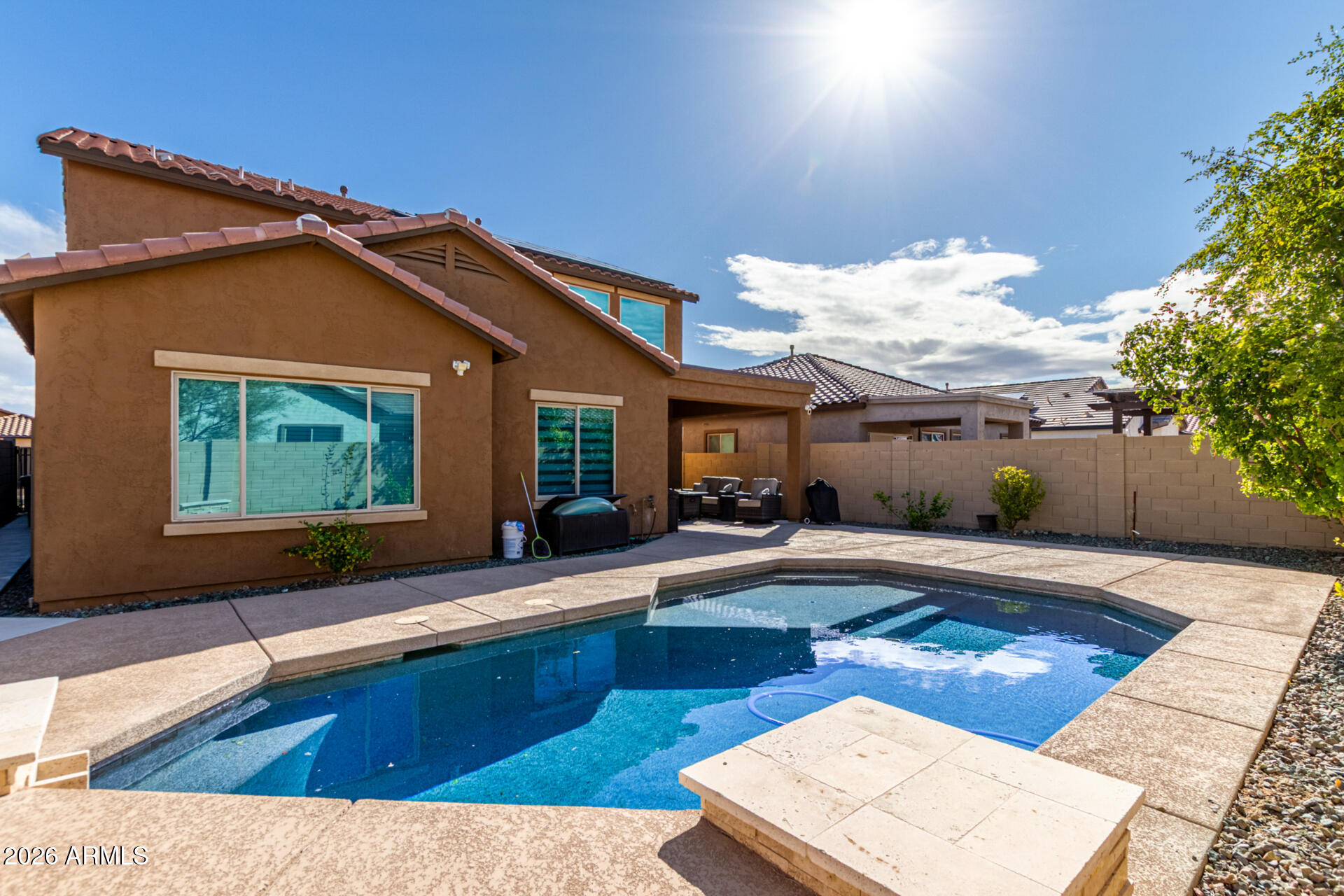 10816 West Nosean Road Peoria, AZ 85383 - Photo 42 of 42 a swimming pool with outdoor seating