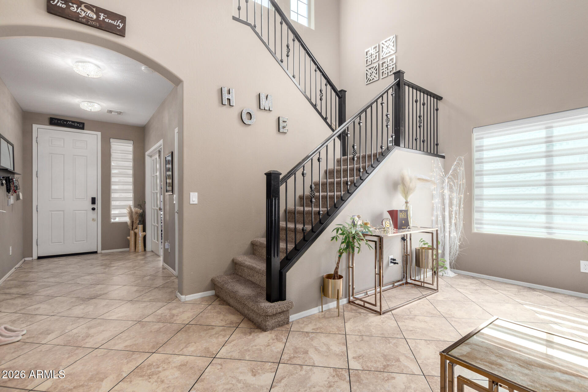 10816 West Nosean Road Peoria, AZ 85383 - Photo 8 of 42 a view of entryway and hall with wooden floor