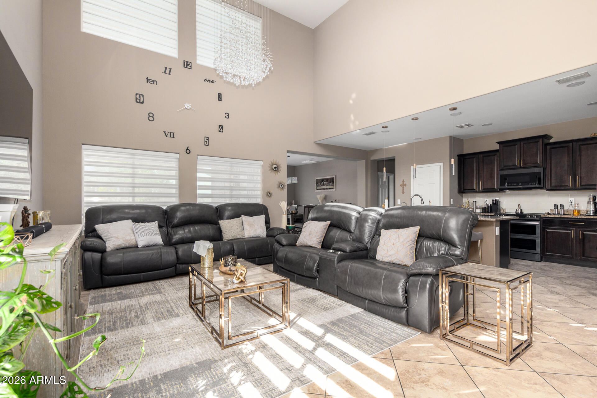 10816 West Nosean Road Peoria, AZ 85383 - Photo 10 of 42 a living room with furniture and a large window