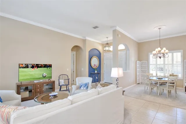 a bed room with a bed and a tv