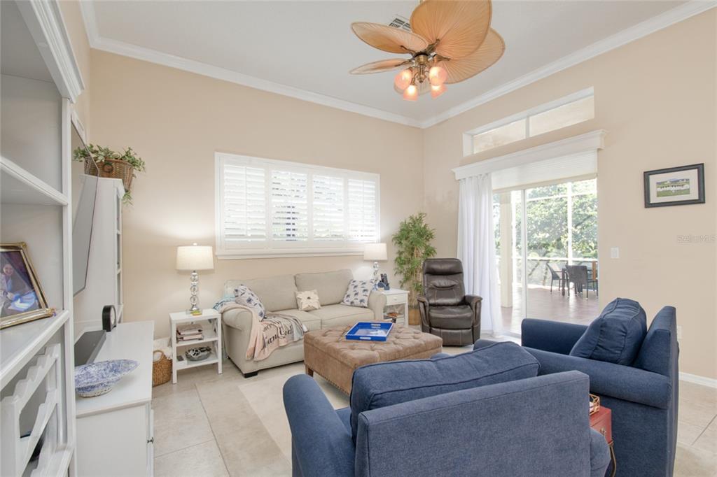 2808 Falcon Ridge Clermont, FL 34711 - Photo 24 of 65 a living room with furniture and a large window