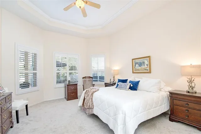 a bedroom with bed and window