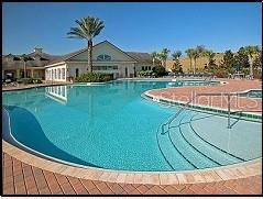 2808 Falcon Ridge Clermont, FL 34711 - Photo 59 of 65 a view of a swimming pool with a garden