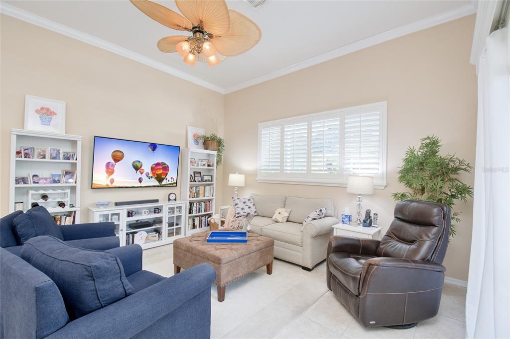 2808 Falcon Ridge Clermont, FL 34711 - Photo 8 of 65 a living room with furniture and a large window