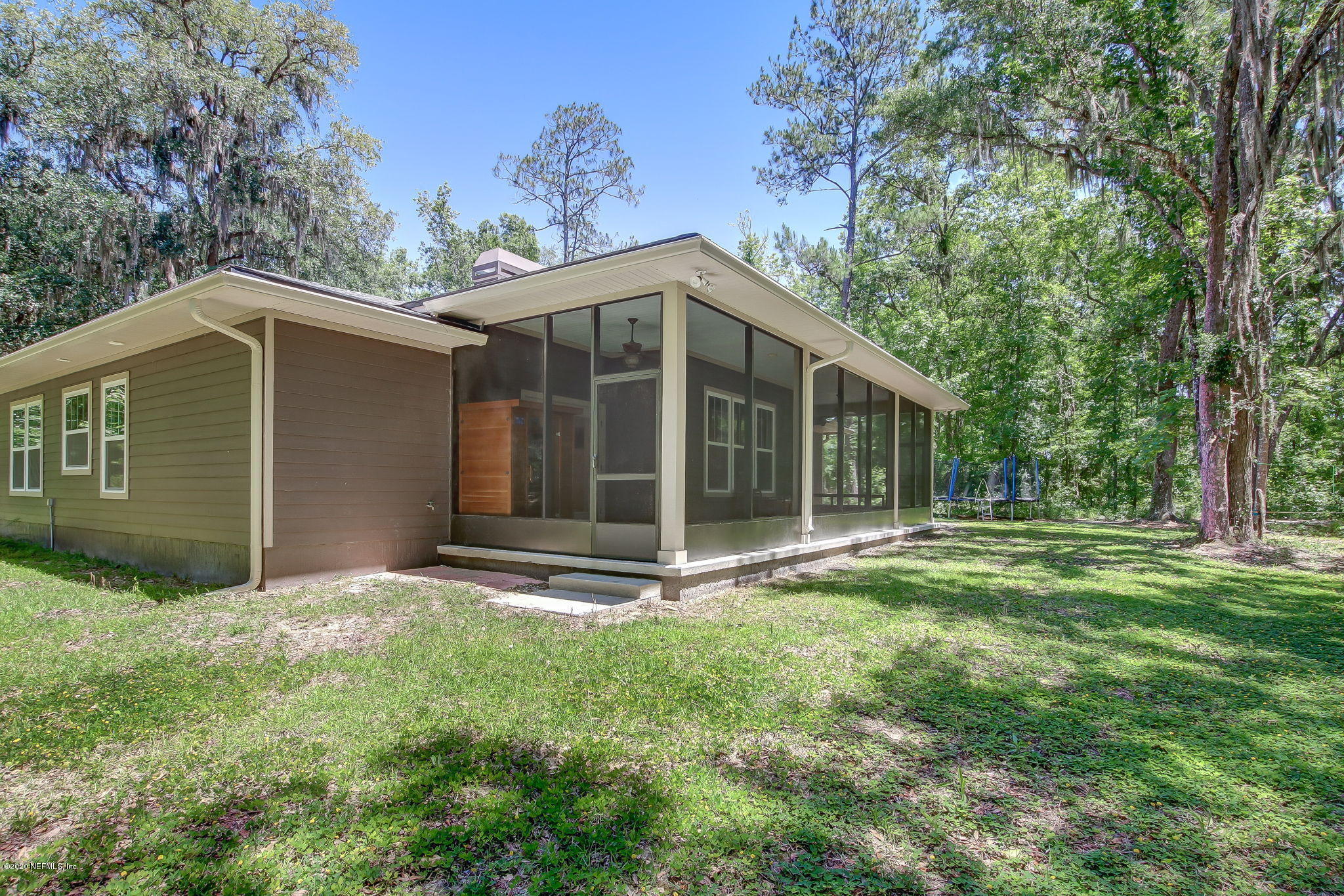 5049 Stephen Colee Road St. Augustine, FL 32092 - Photo 45 of 55 a view of a house with a yard
