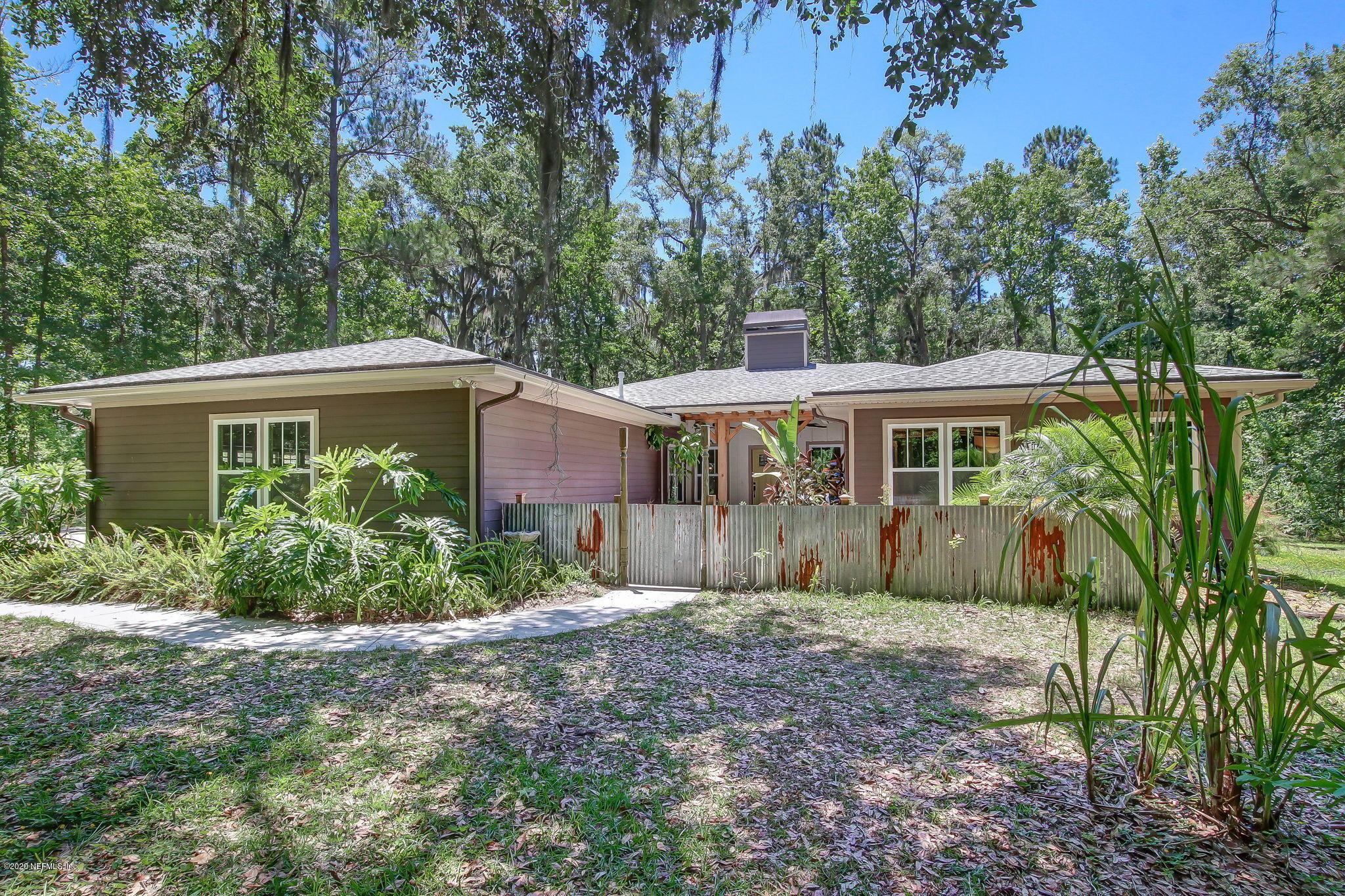 5049 Stephen Colee Road St. Augustine, FL 32092 - Photo 54 of 55 front view of a house with a yard