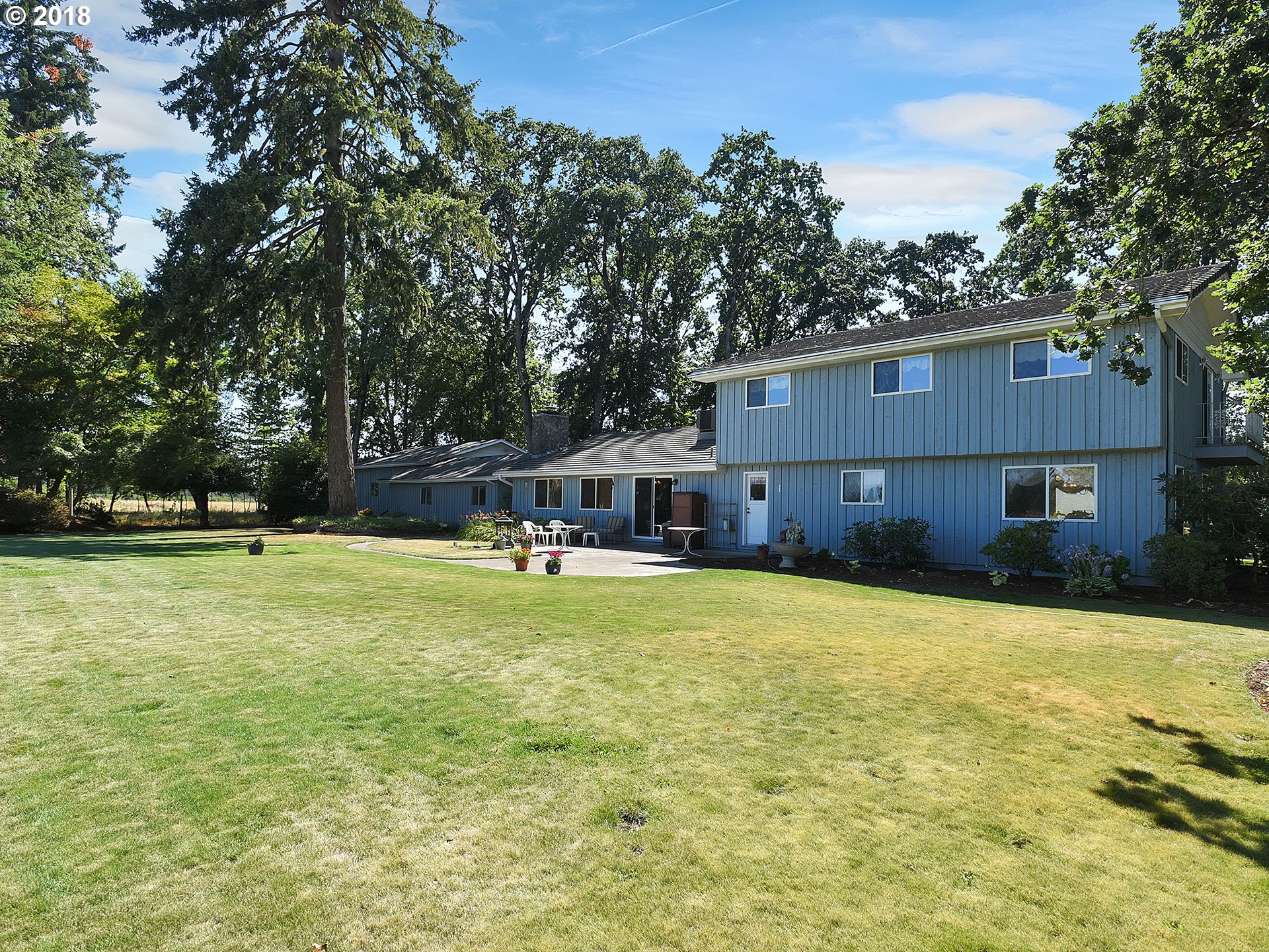 9850 South Barnards Road Canby, OR 97013 - Photo 30 of 32 a view of a house with a yard