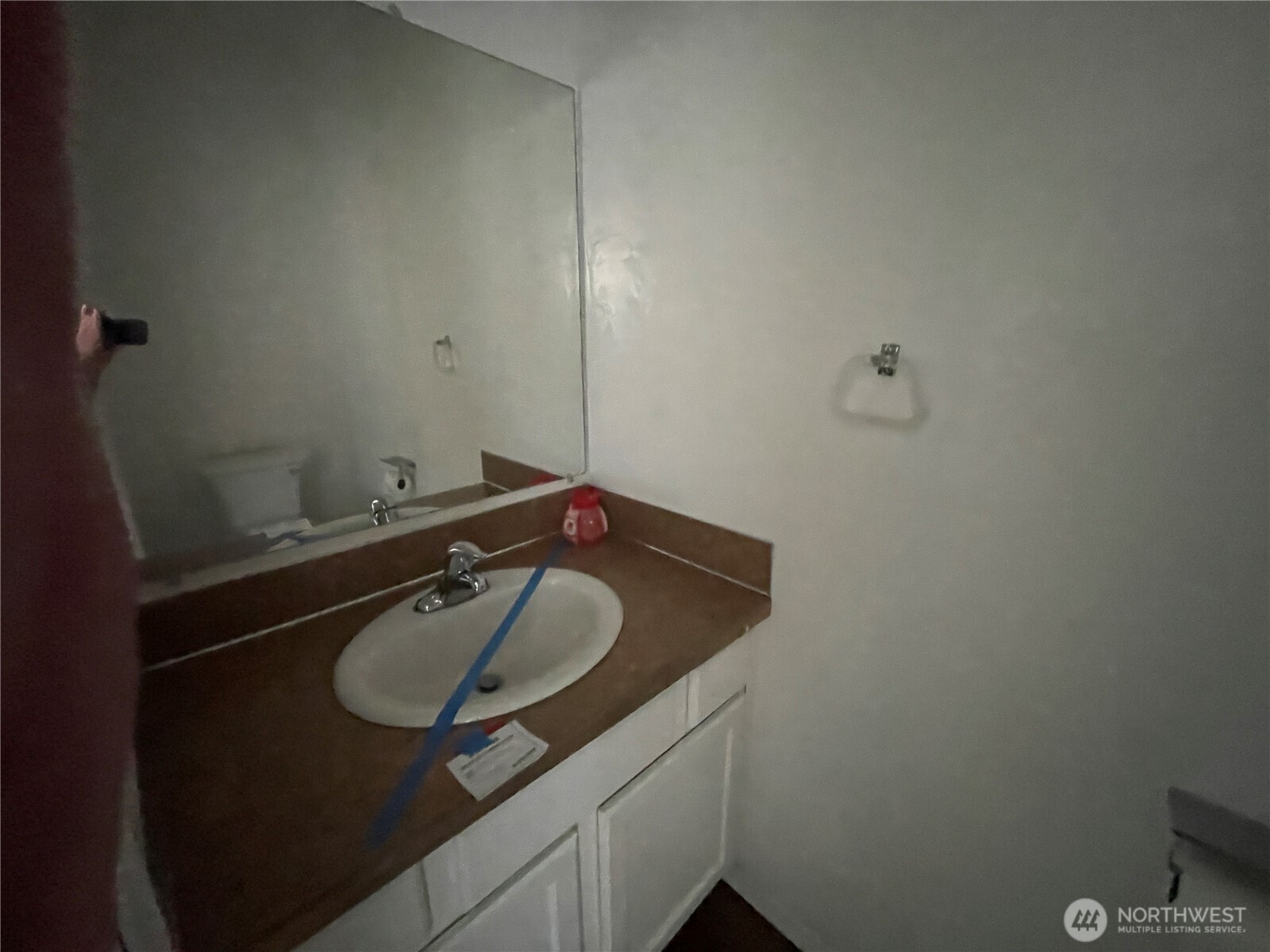 911 West Front Street Winlock, WA 98596 - Photo 12 of 30 a bathroom with a sink and a mirror