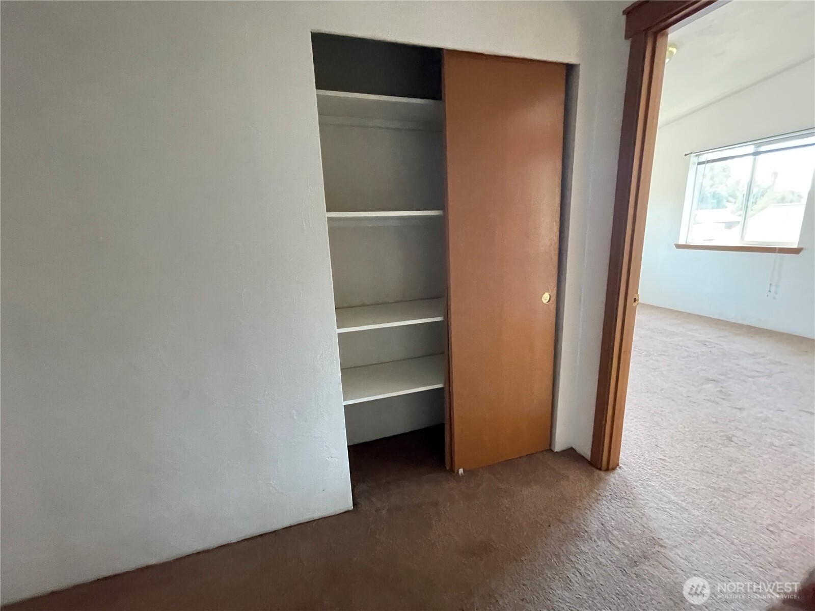911 West Front Street Winlock, WA 98596 - Photo 19 of 30 a view of an empty room with a closet
