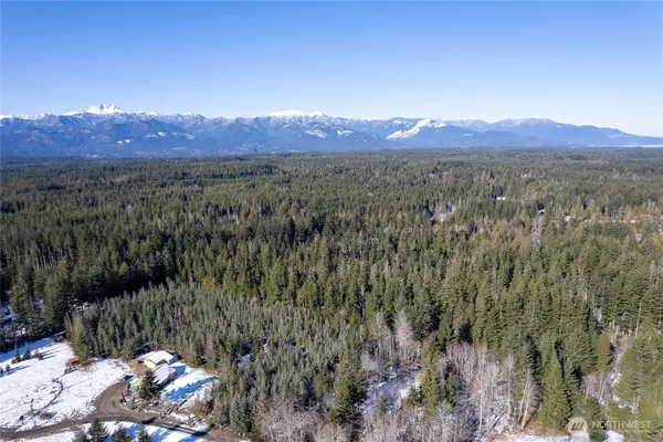 a view of a city with mountain