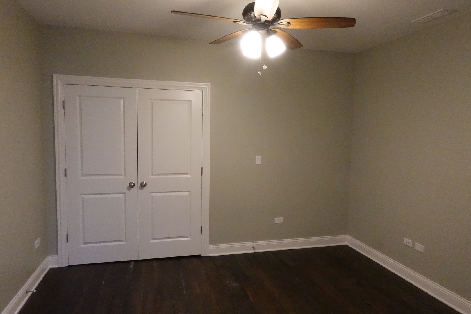 809 North Franklin Street, Unit 3F Chicago, IL 60610 - Photo 11 of 17 an empty room with closet and fan
