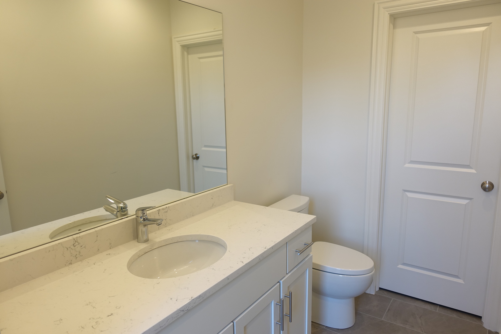 809 North Franklin Street, Unit 3F Chicago, IL 60610 - Photo 13 of 17 a bathroom with a sink and a toilet