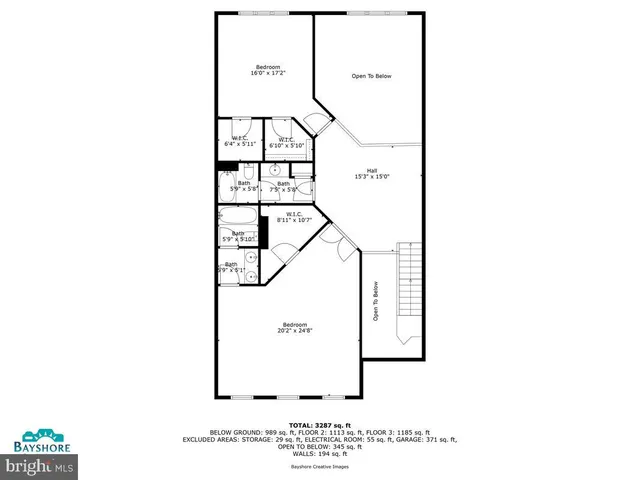 a view of a workspace with furniture and bookshelf