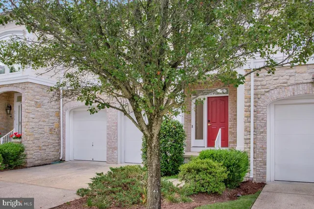 a view of a kitchen with wooden floor