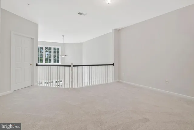 a view of a house with a yard and plants