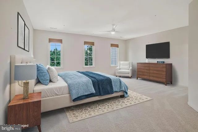 a view of a sign on a wall next to a road