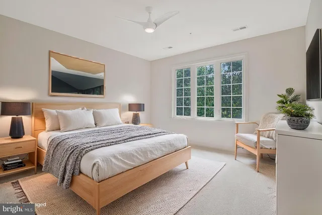 a kitchen with stainless steel appliances granite countertop a stove a sink dishwasher and cabinets with wooden floor