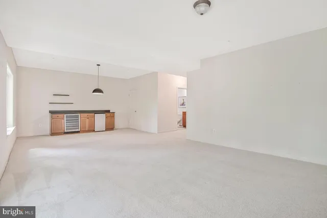 a view of swimming pool with a patio