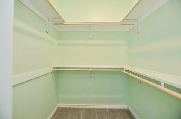 a view of a room with racks on the wall