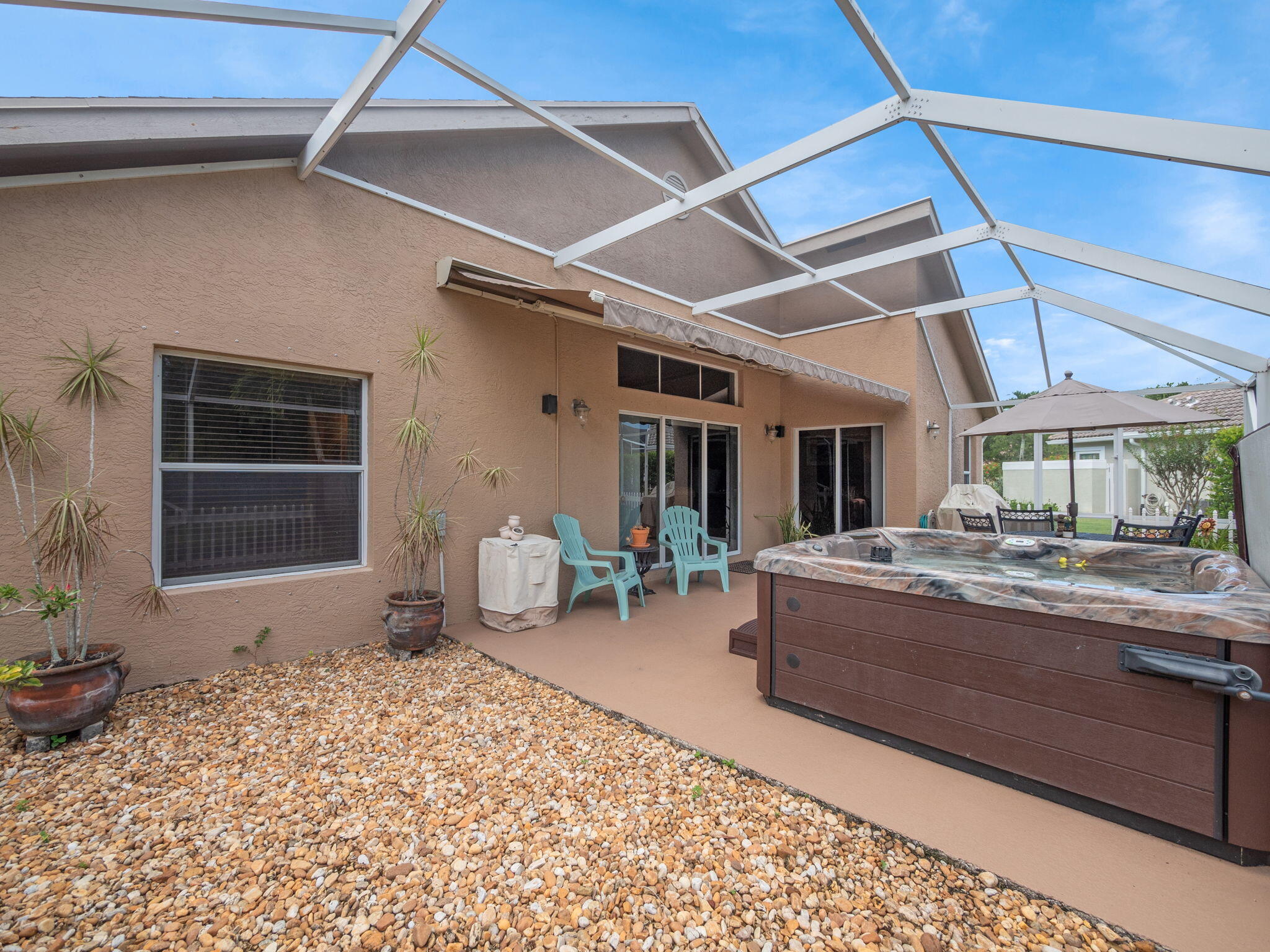 8121 Southwest Yachtsmans Drive Stuart, FL 34997 - Photo 28 of 28 a living room with a couch