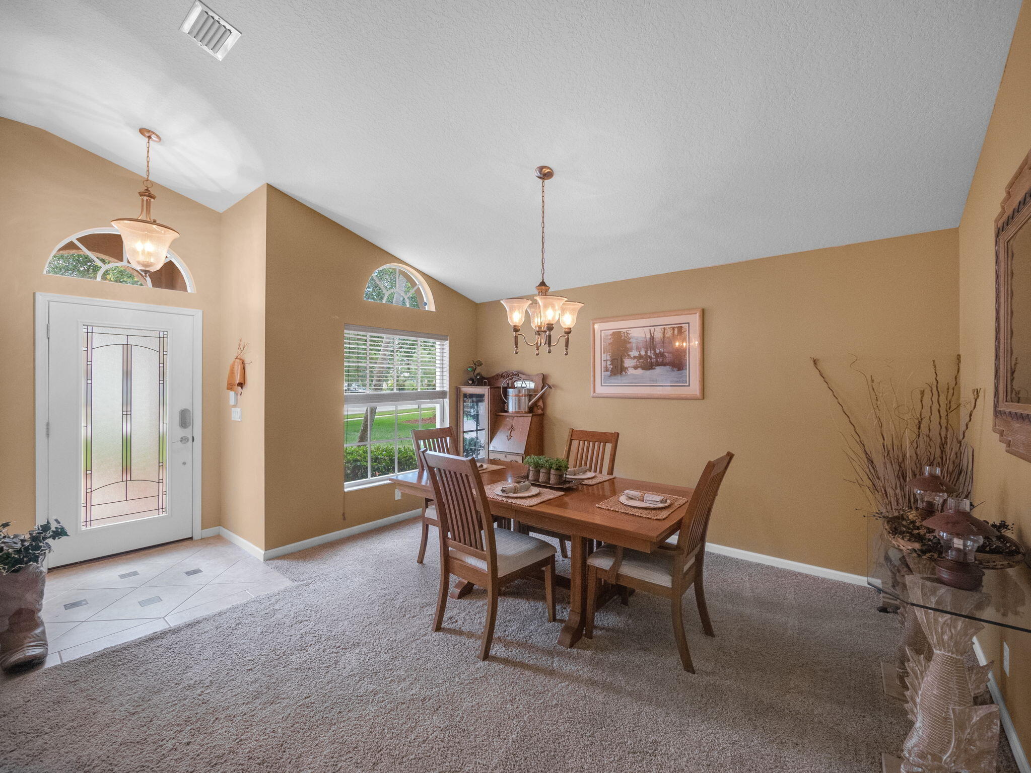 8121 Southwest Yachtsmans Drive Stuart, FL 34997 - Photo 7 of 28 a view of a dining room with furniture window and outside view