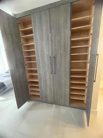 a room with storage and utility