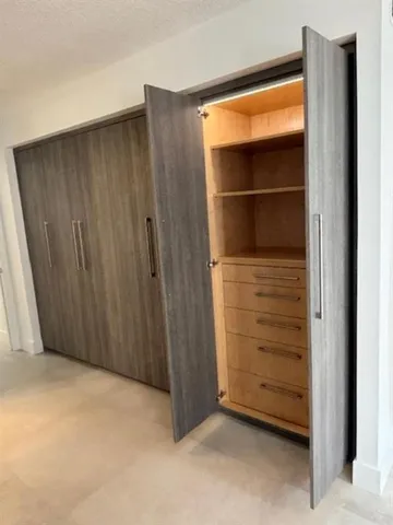 a room with storage and utility