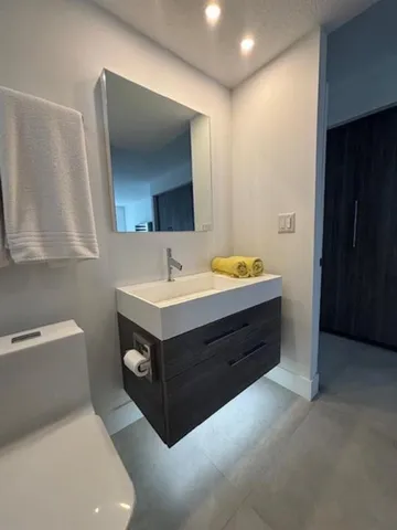 a view of livingroom with hallway and closet