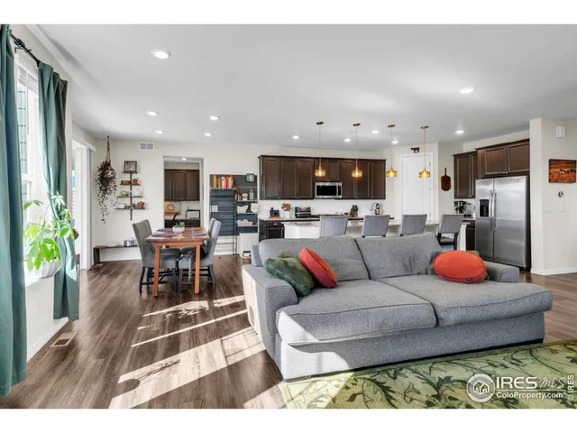 a kitchen with a sink cabinets and appliances